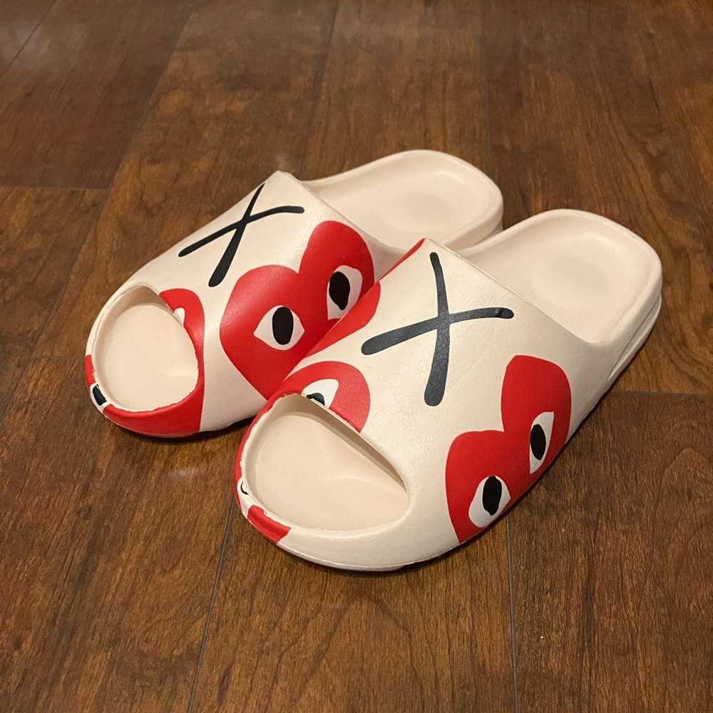 Comme des Garçons PLAY Slides